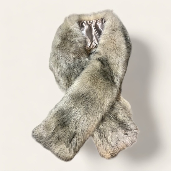 Danier Accessories - Bring out your best Cruella with this piece 🧣